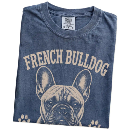 Folded Denim Comfort Colors® T-shirt showing French Bulldog design with “Small Frame, Main Character Energy” lettering