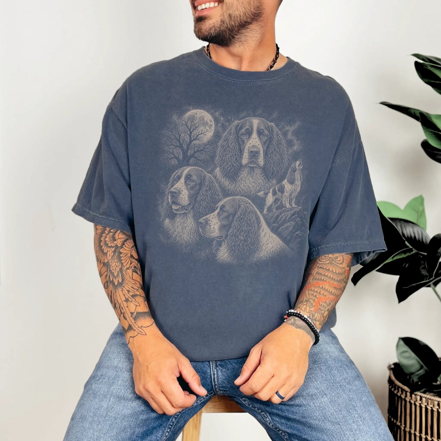 Model wearing a Denim Comfort Colors® T-shirt with a vintage moon montage featuring Springer Spaniel