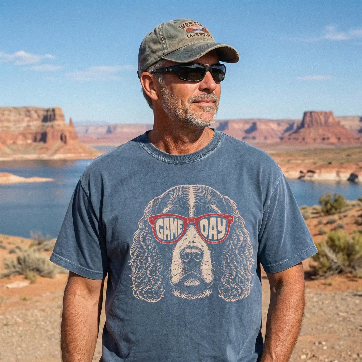 Model wearing a Denim Comfort Colors® T-shirt with springer spaniel wearing red game day sunglasses