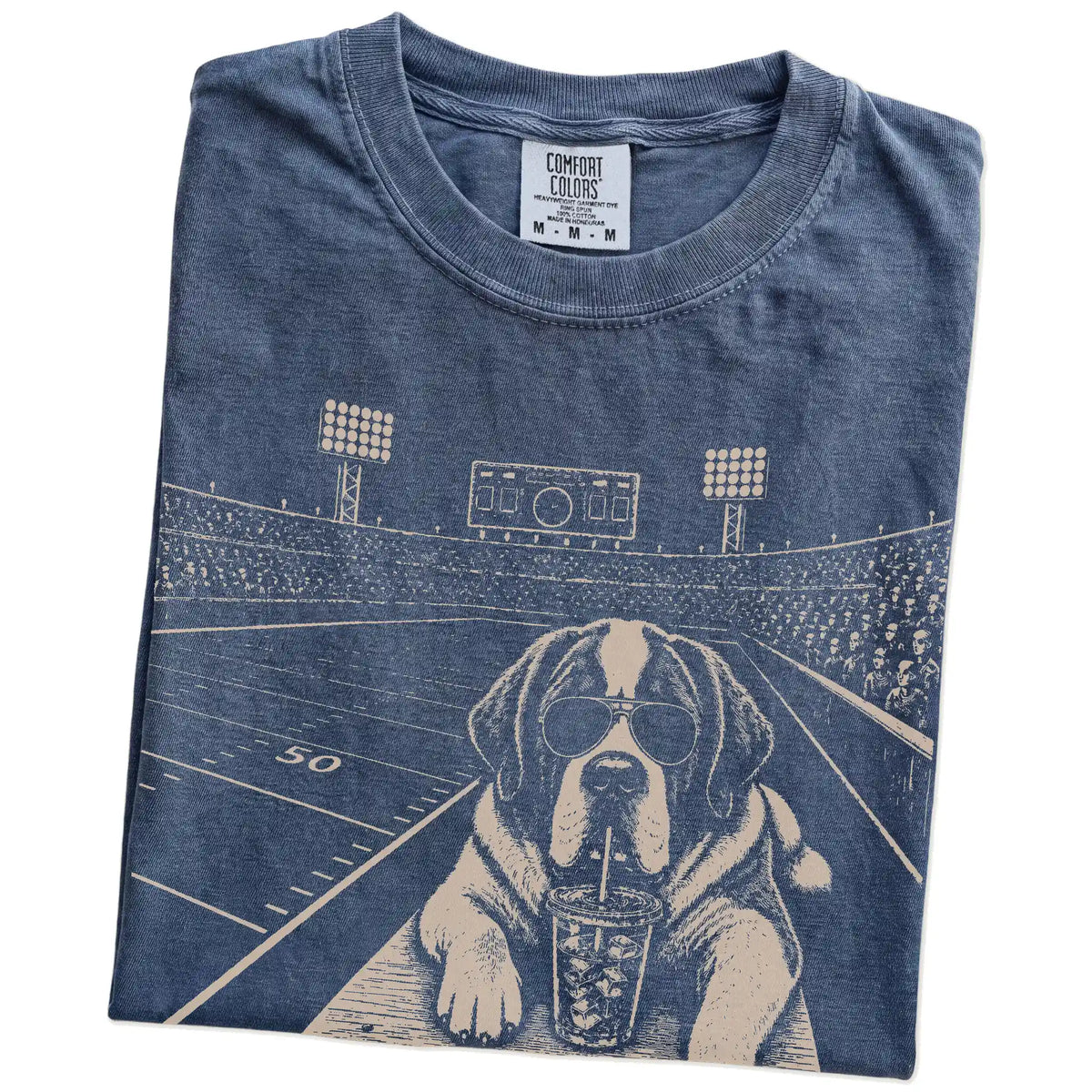 Folded Denim Comfort Colors® T-shirt showing Saint Bernard ready for football and tailgate season