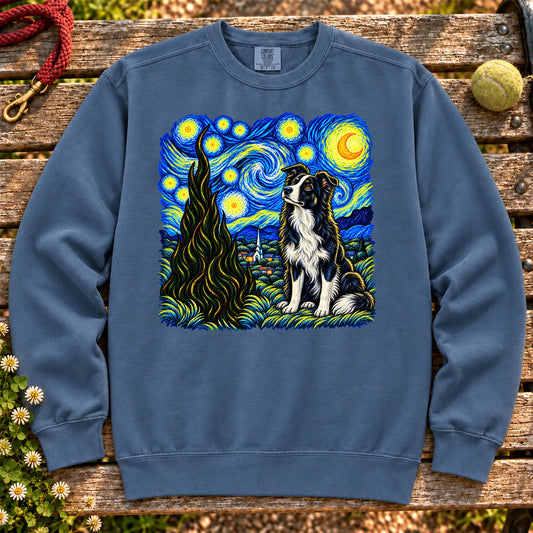 Colorful Border Collie beneath a swirling starry night sky on a Denim sweatshirt