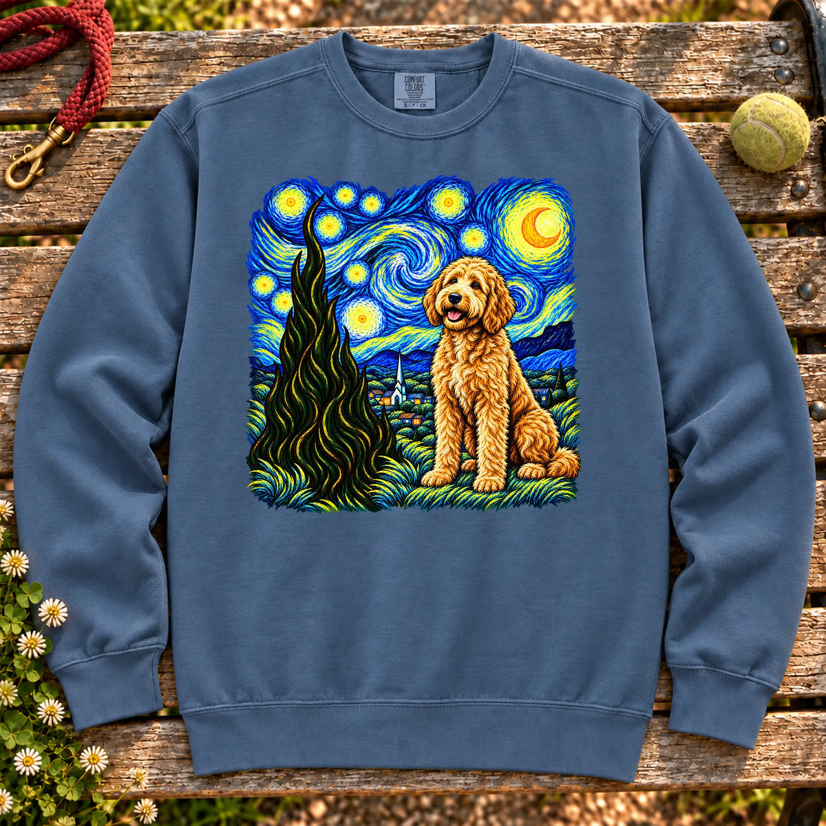 Colorful Goldendoodle beneath a swirling starry night sky on a Denim sweatshirt