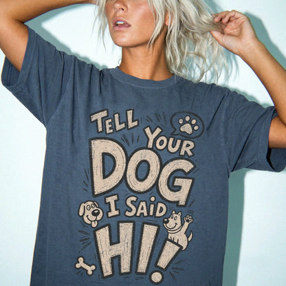 Model wearing a Denim Comfort Colors® T-shirt with tell your dog i said hi lettering