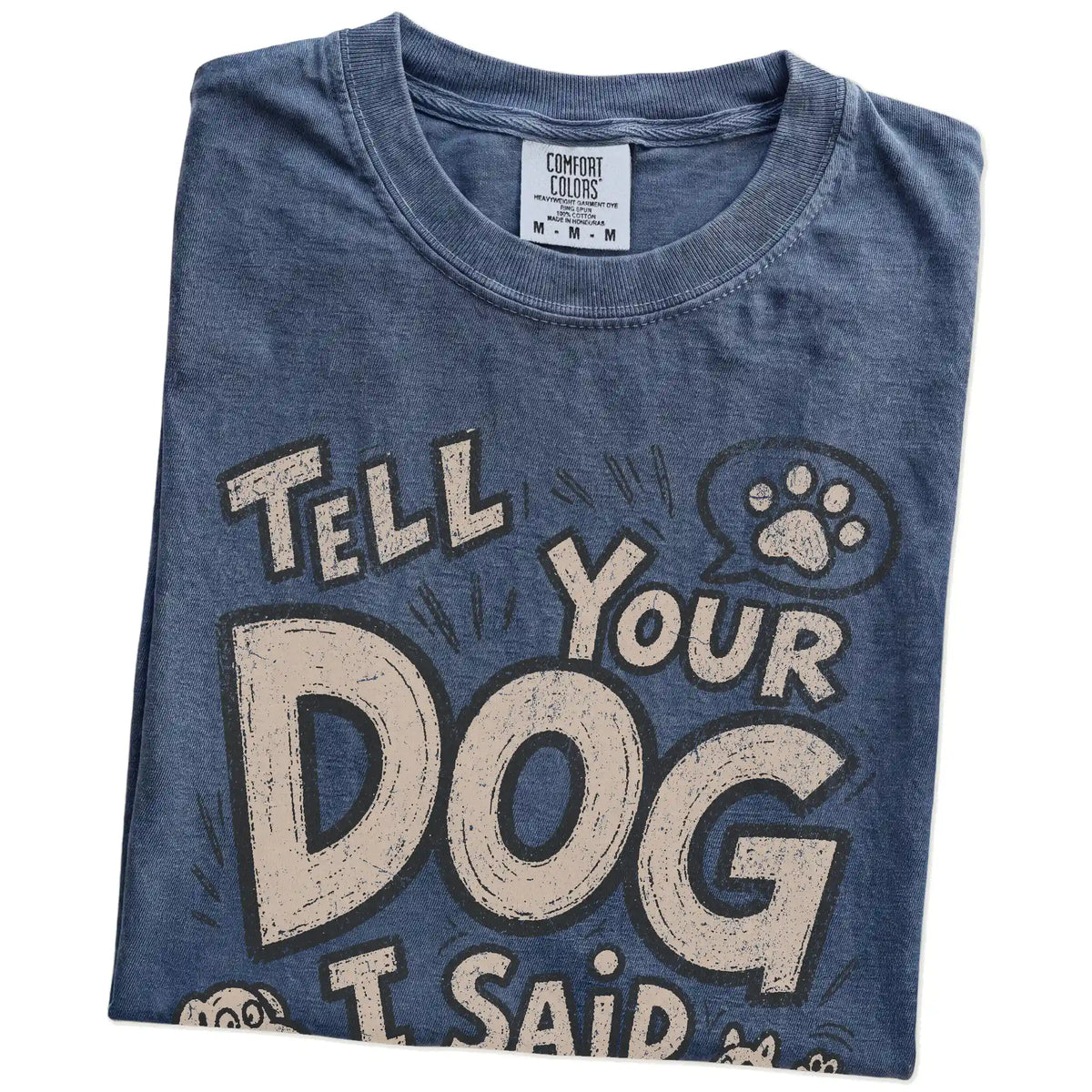 Folded Denim Comfort Colors® T-shirt showing tell your dog i said hi lettering