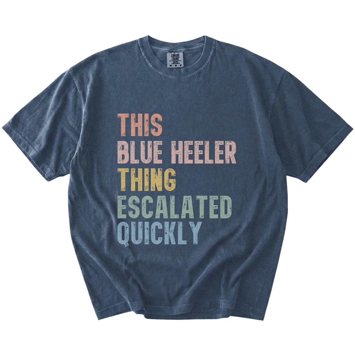 retro “This Blue Heeler Thing Escalated Quickly” lettering on a Denim Comfort Colors® T-shirt