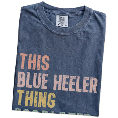 Folded Denim Comfort Colors® T-shirt showing retro “This Blue Heeler Thing Escalated Quickly” lettering