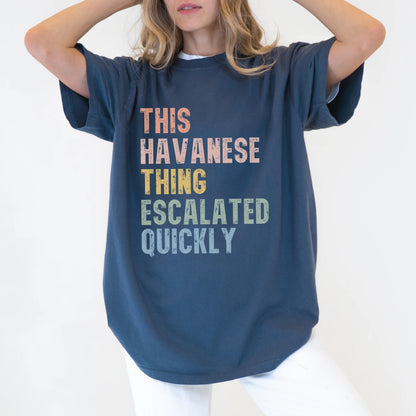 Model wearing a Denim Comfort Colors® T-shirt with retro “This Havanese Thing Escalated Quickly” lettering