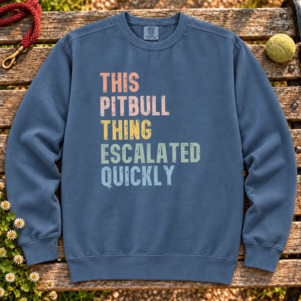 “This Pitbull thing escalated quickly” text on a Denim sweatshirt