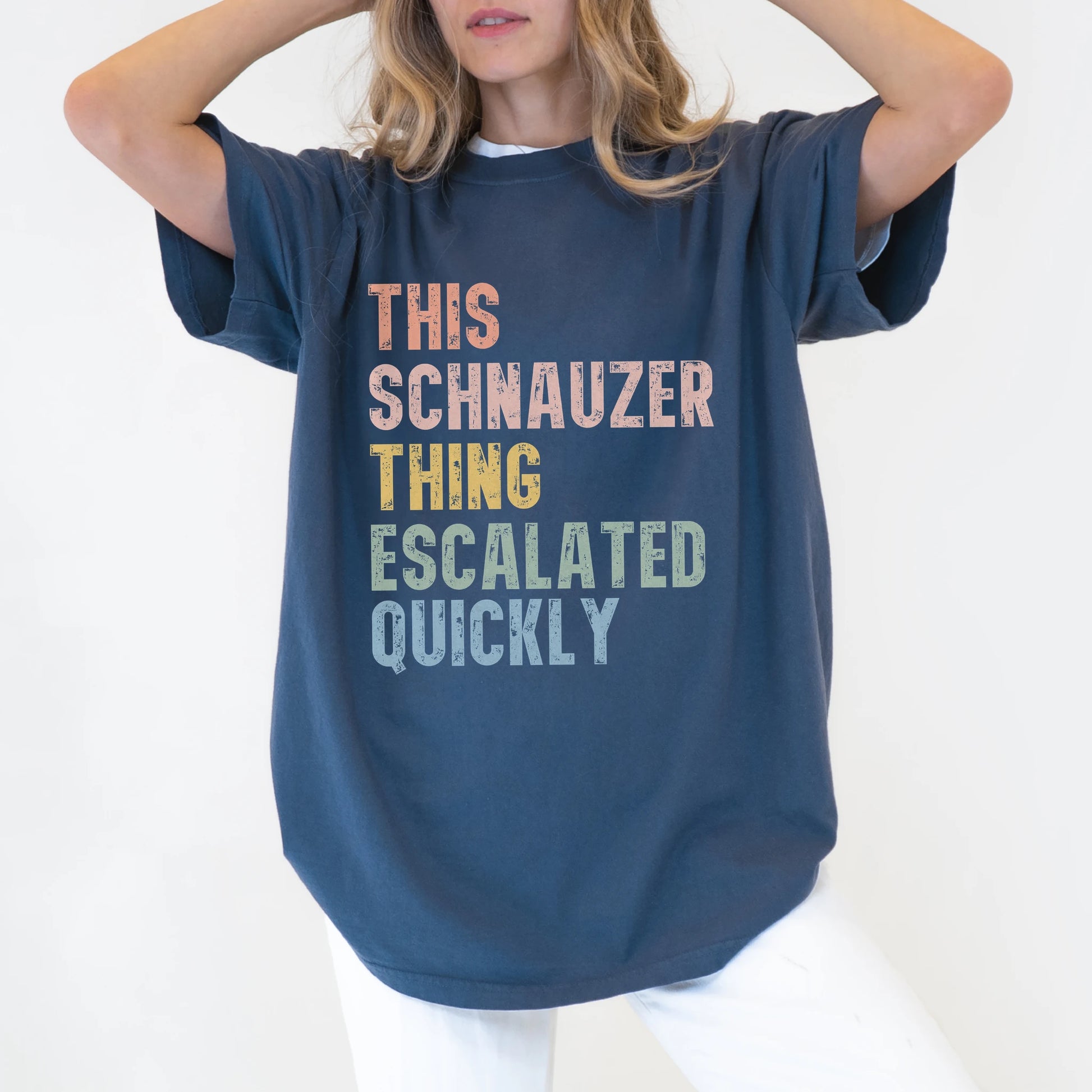 Model wearing a Denim Comfort Colors® T-shirt with retro “This Schnauzer Thing Escalated Quickly” lettering