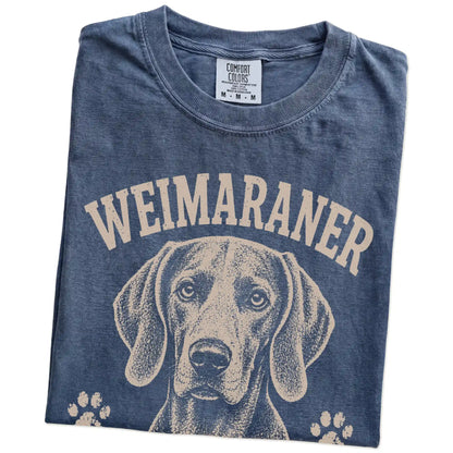 Folded Denim Comfort Colors® T-shirt showing Weimaraner design with “Velcro Mode” lettering