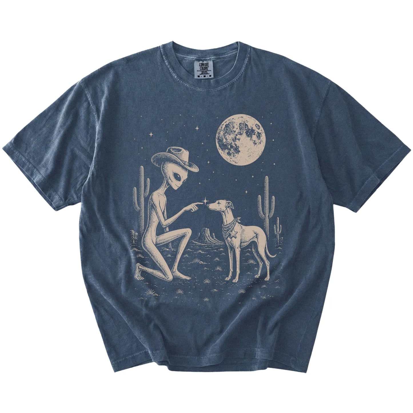Cowboy alien fist-bumping a Whippet beneath the moon on a Denim Comfort Colors® T-shirt