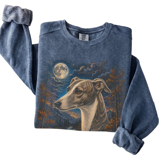 Folded denim sweatshirt with Whippet Autumn Moon artwork.