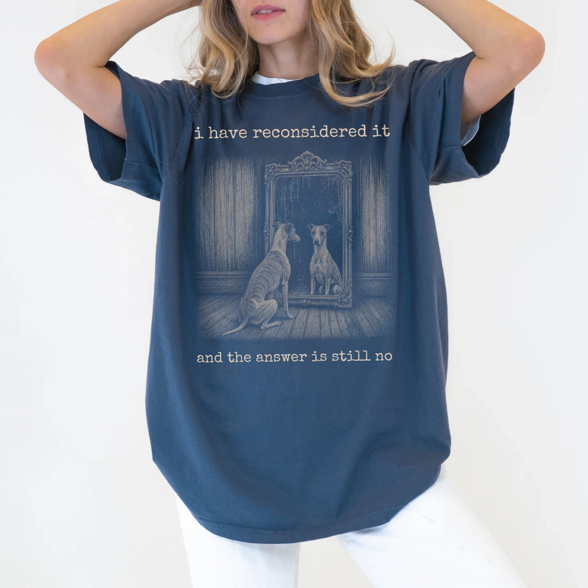 Model wearing a Denim Comfort Colors® T-shirt with “the answer is still no” whippet design