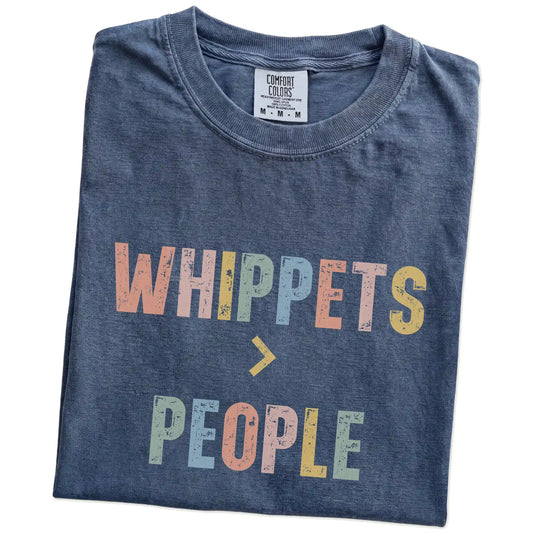 Folded Denim Comfort Colors® T-shirt showing “Whippets > People” text