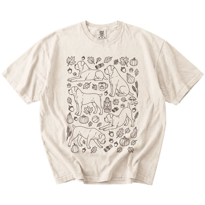 Cane Corso dogs with pumpkins, leaves, acorns, and woodland details on a Ivory Comfort Colors® T-shirt