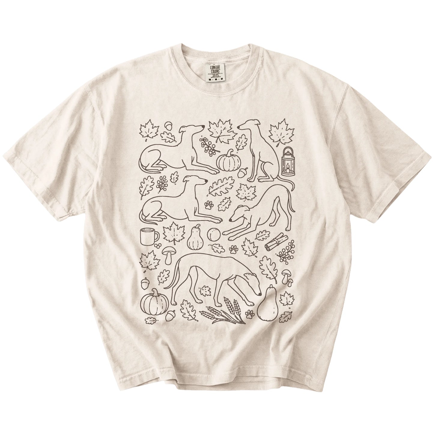 Greyhound dogs with pumpkins, leaves, acorns, and woodland details on a Ivory Comfort Colors® T-shirt