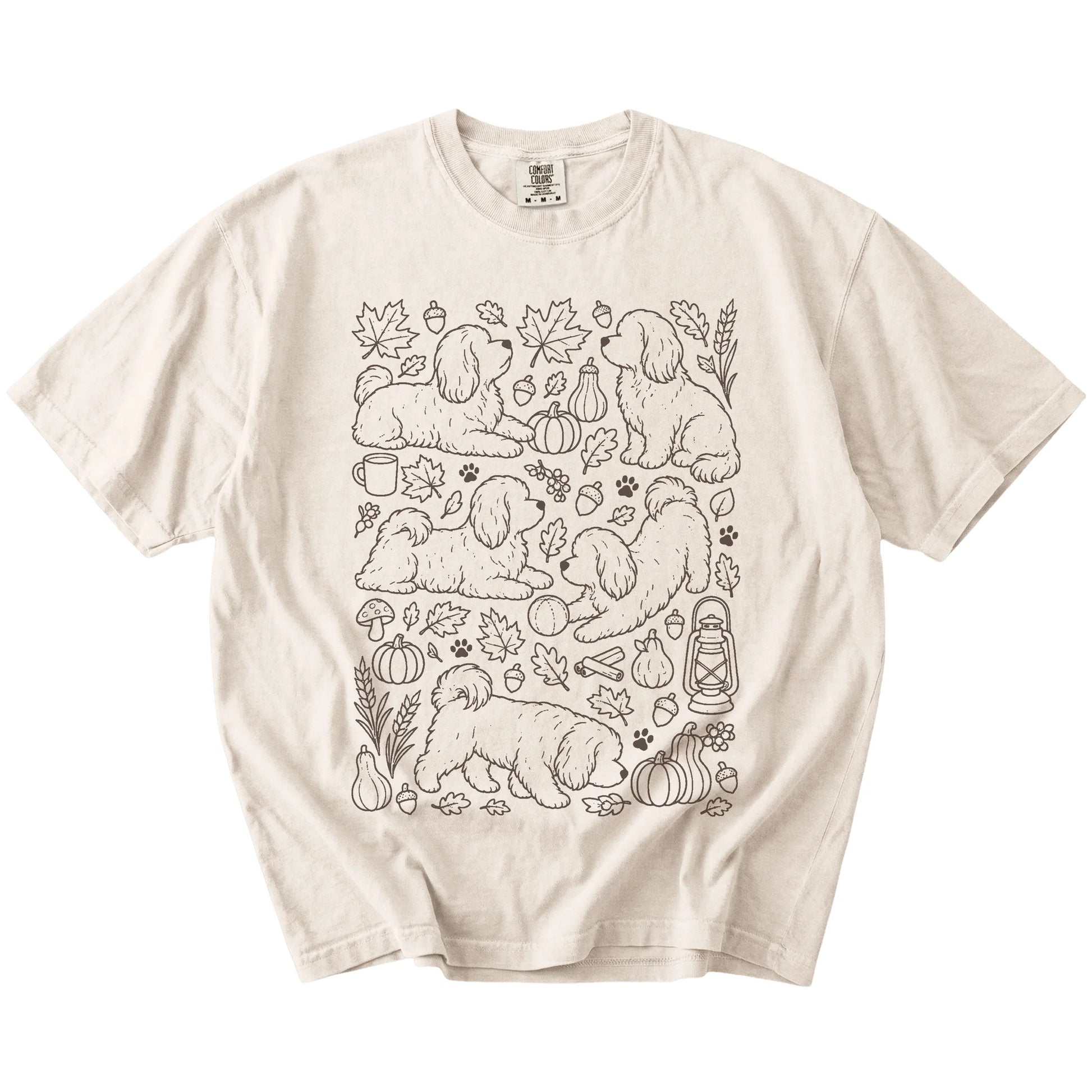 Havanese dogs with pumpkins, leaves, acorns, and woodland details on a Ivory Comfort Colors® T-shirt