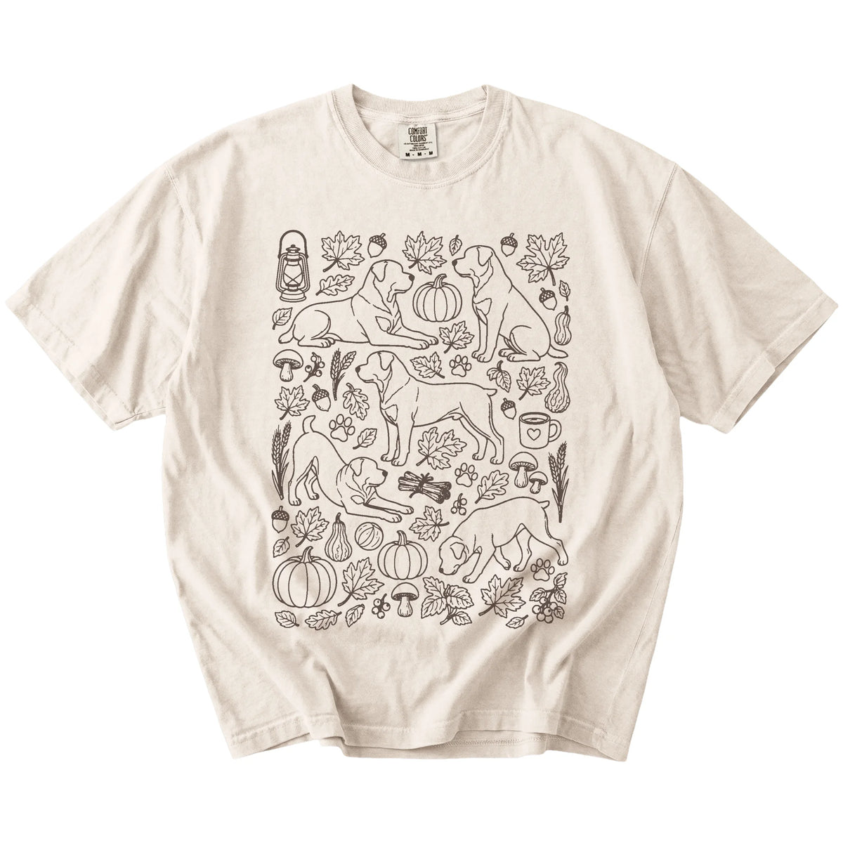 Rottweiler dogs with pumpkins, leaves, acorns, and woodland details on a Ivory Comfort Colors® T-shirt