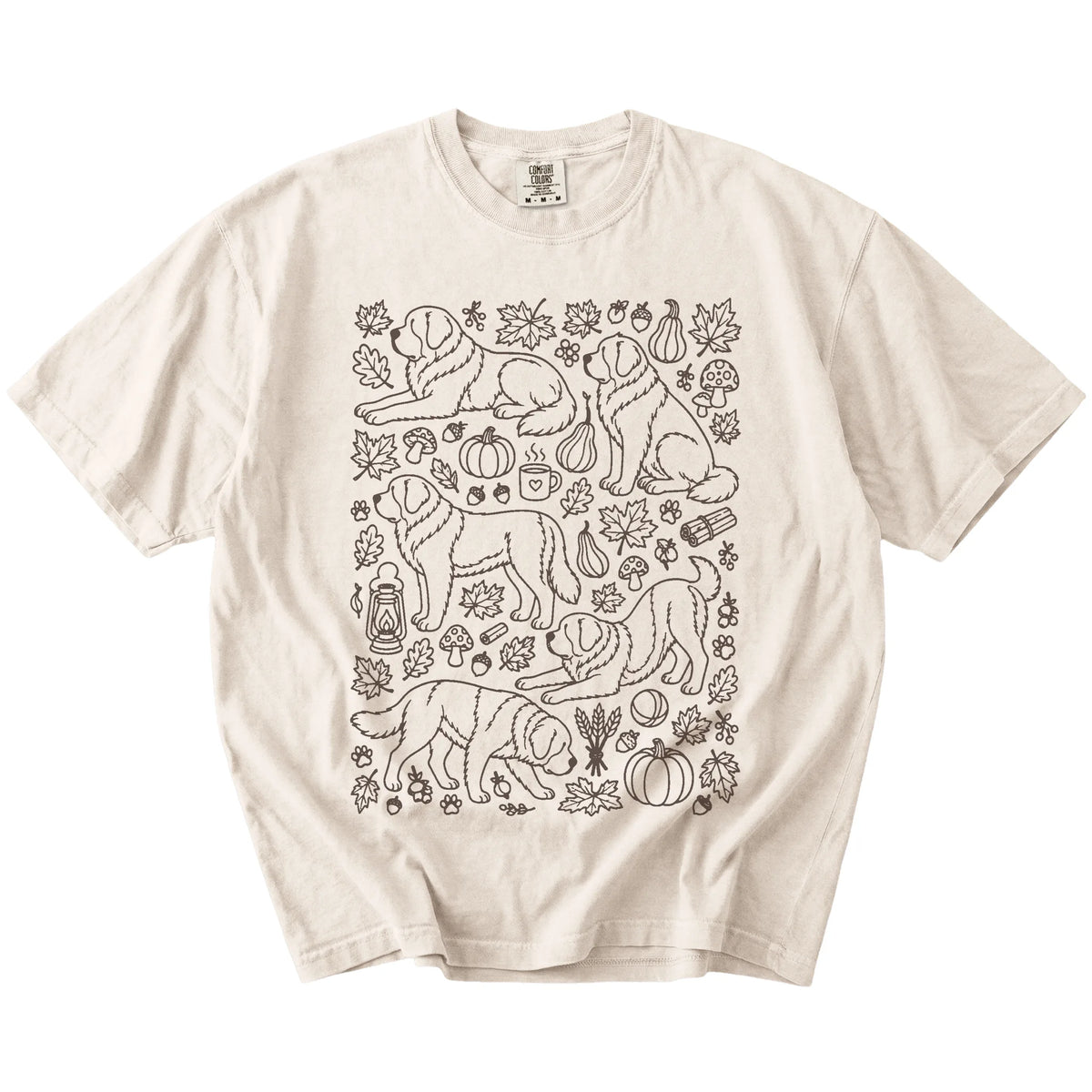 Saint Bernard dogs with pumpkins, leaves, acorns, and woodland details on a Ivory Comfort Colors® T-shirt