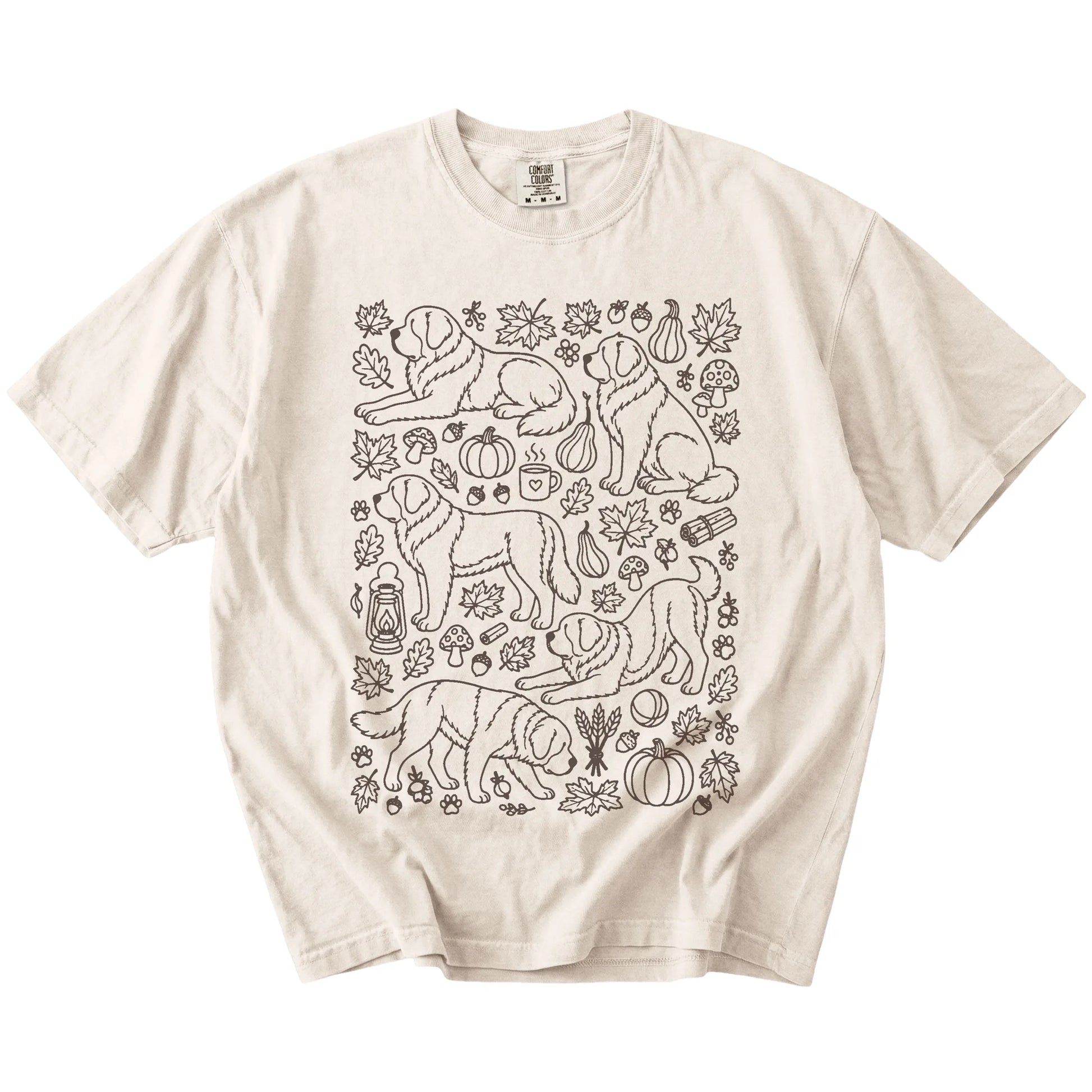 Saint Bernard dogs with pumpkins, leaves, acorns, and woodland details on a Ivory Comfort Colors® T-shirt