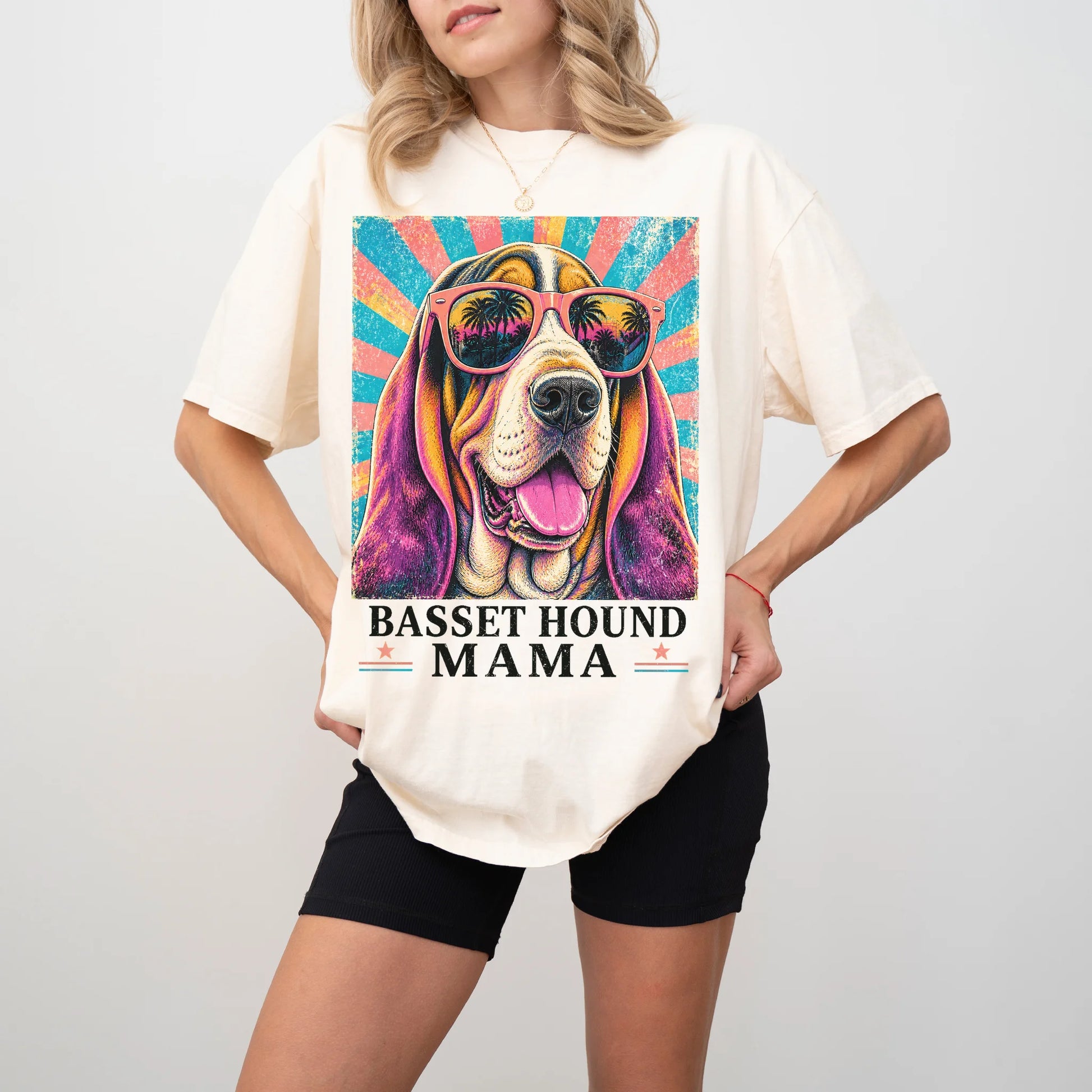 Retro Basset Hound Mama design on a Ivory Comfort Colors T-shirt worn by a model