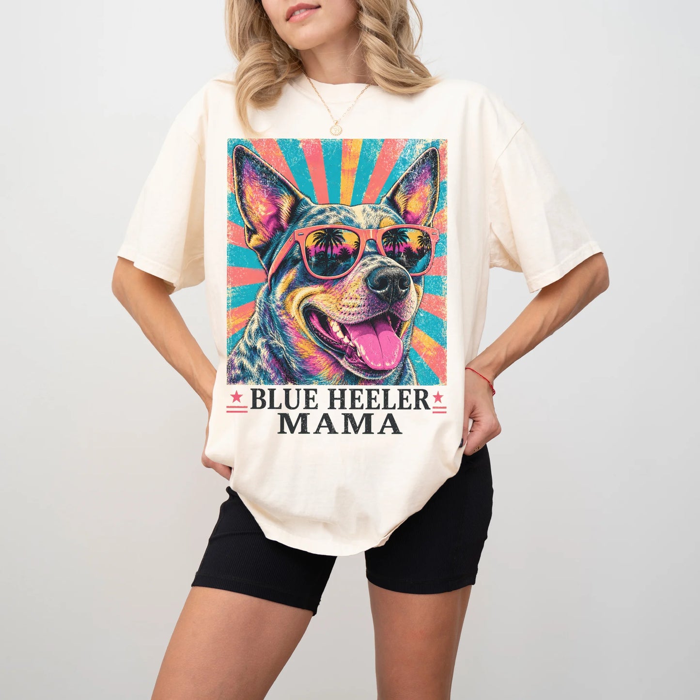 Retro Blue Heeler Mama design on a Ivory Comfort Colors T-shirt worn by a model