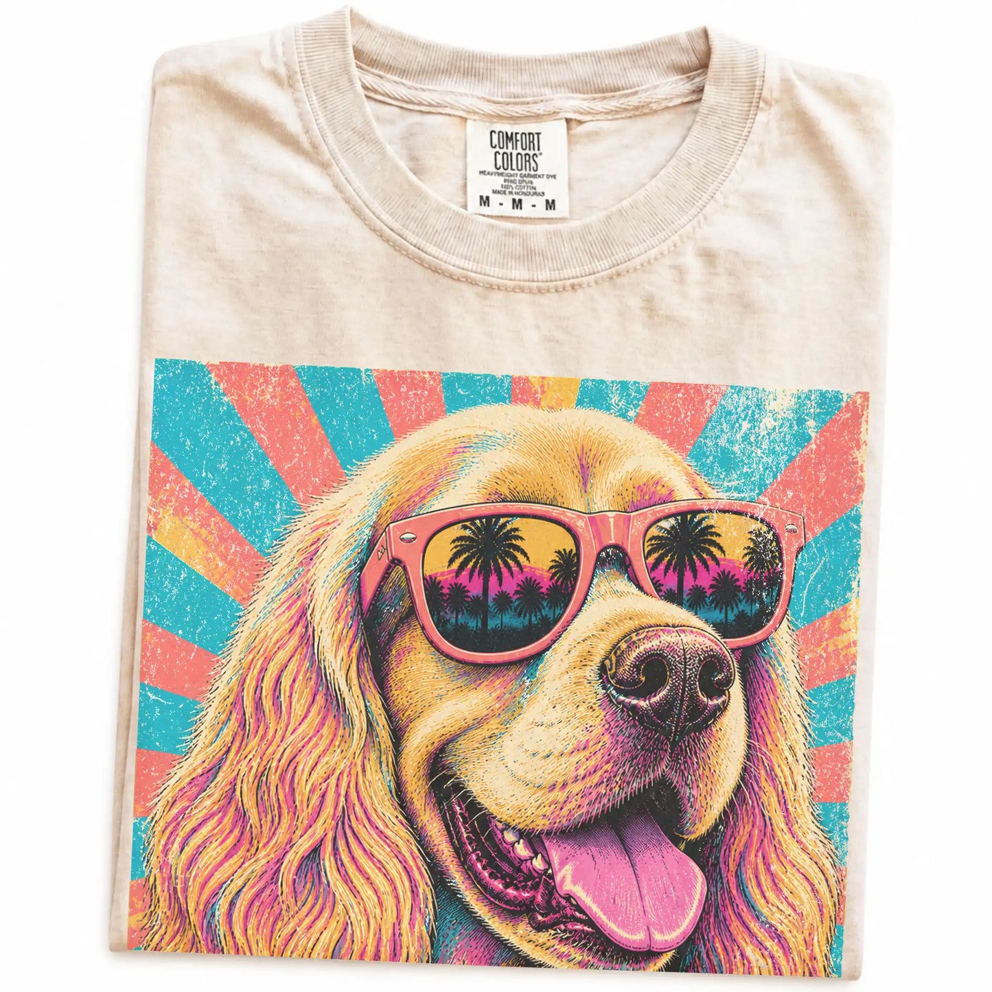 Retro Cocker Spaniel Mama design on a Ivory Comfort Colors T-shirt folded detail