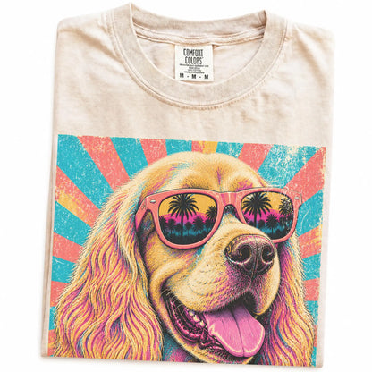 Retro Cocker Spaniel Mama design on a Ivory Comfort Colors T-shirt folded detail