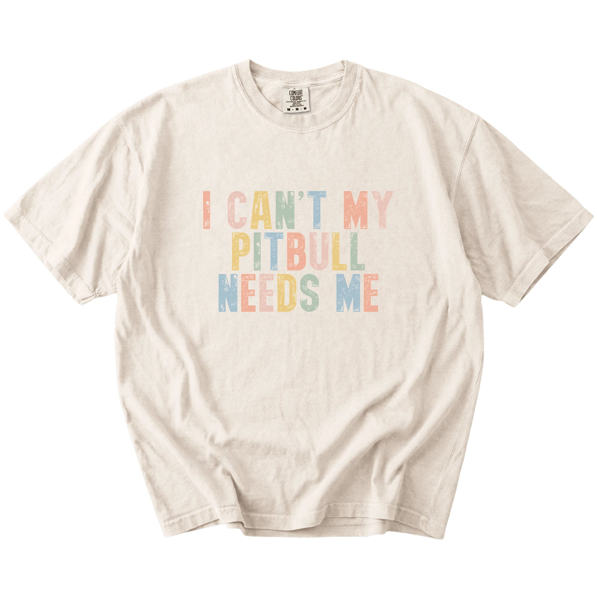 Pitbull with “I Can’t, My Dog Needs Me” lettering on a Ivory Comfort Colors® T-shirt