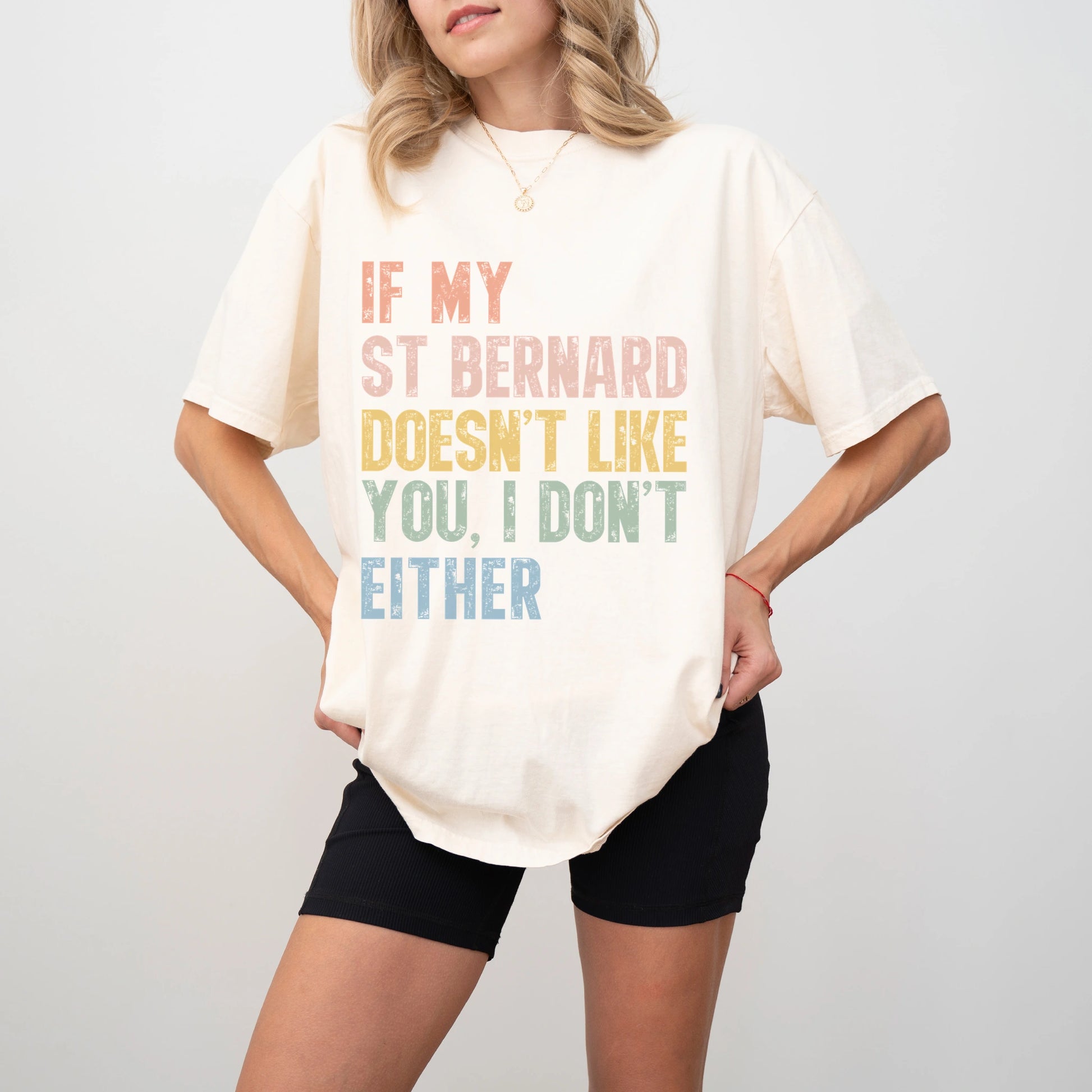 Model wearing a Ivory Comfort Colors® T-shirt featuring Saint Bernard with “If My Dog Doesn’t Like You, I Don’t Either” lette