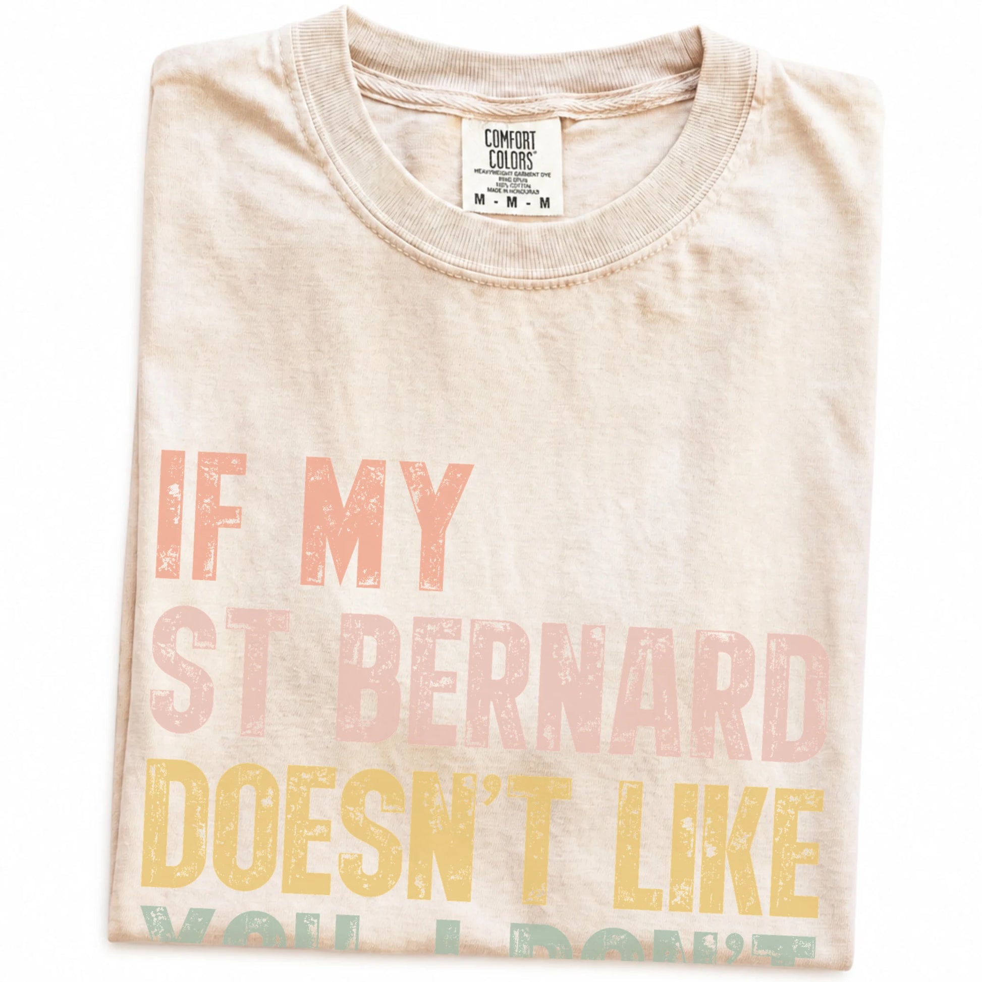 Folded Ivory Comfort Colors® T-shirt showing Saint Bernard with “If My Dog Doesn’t Like You, I Don’t Either” lettering
