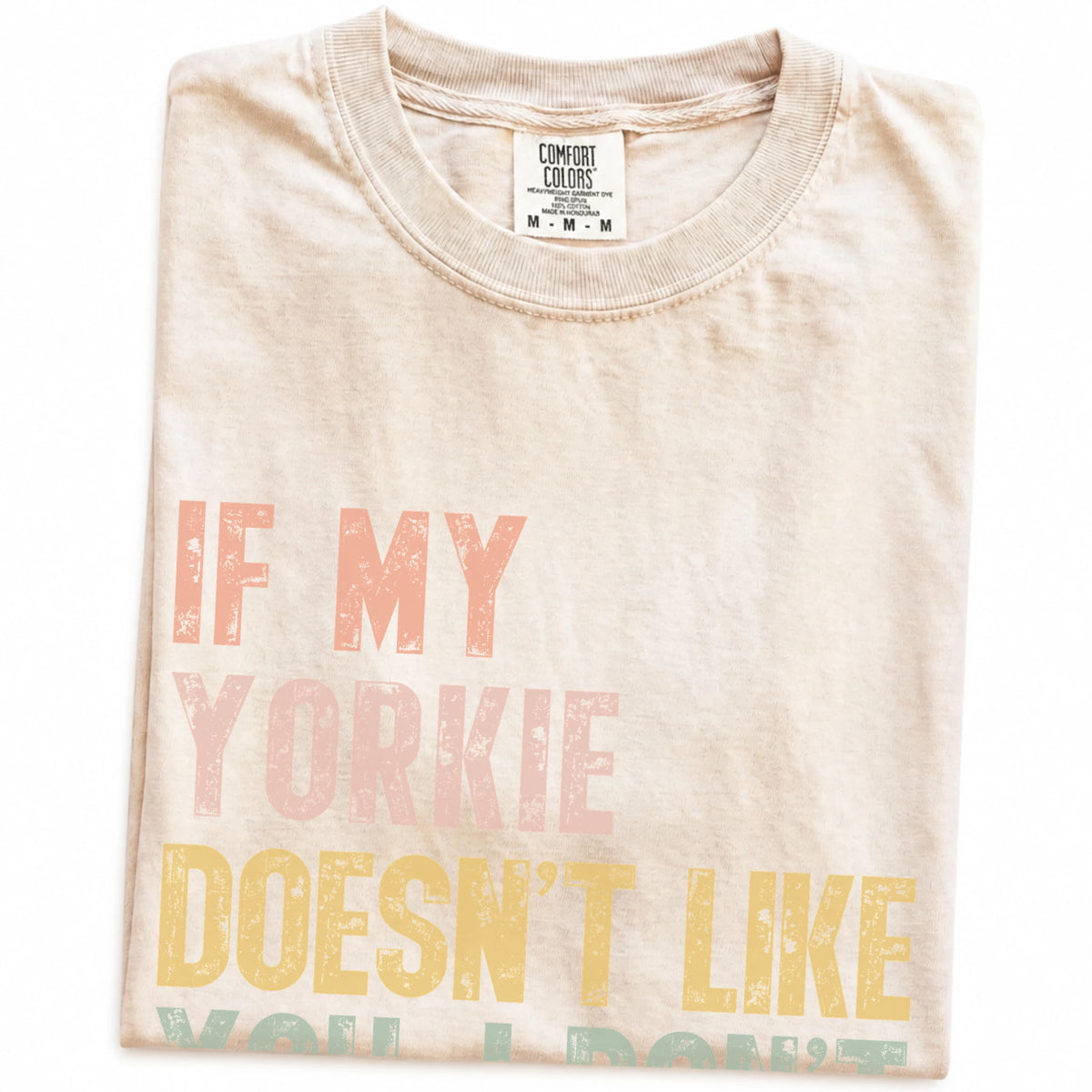 Folded Ivory Comfort Colors® T-shirt showing Yorkie with “If My Dog Doesn’t Like You, I Don’t Either” lettering