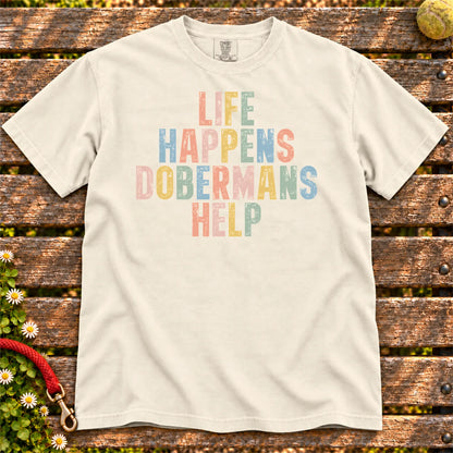 Doberman making hard days better with “Life Happens, Dogs Help” lettering on a Ivory Comfort Colors® T-shirt