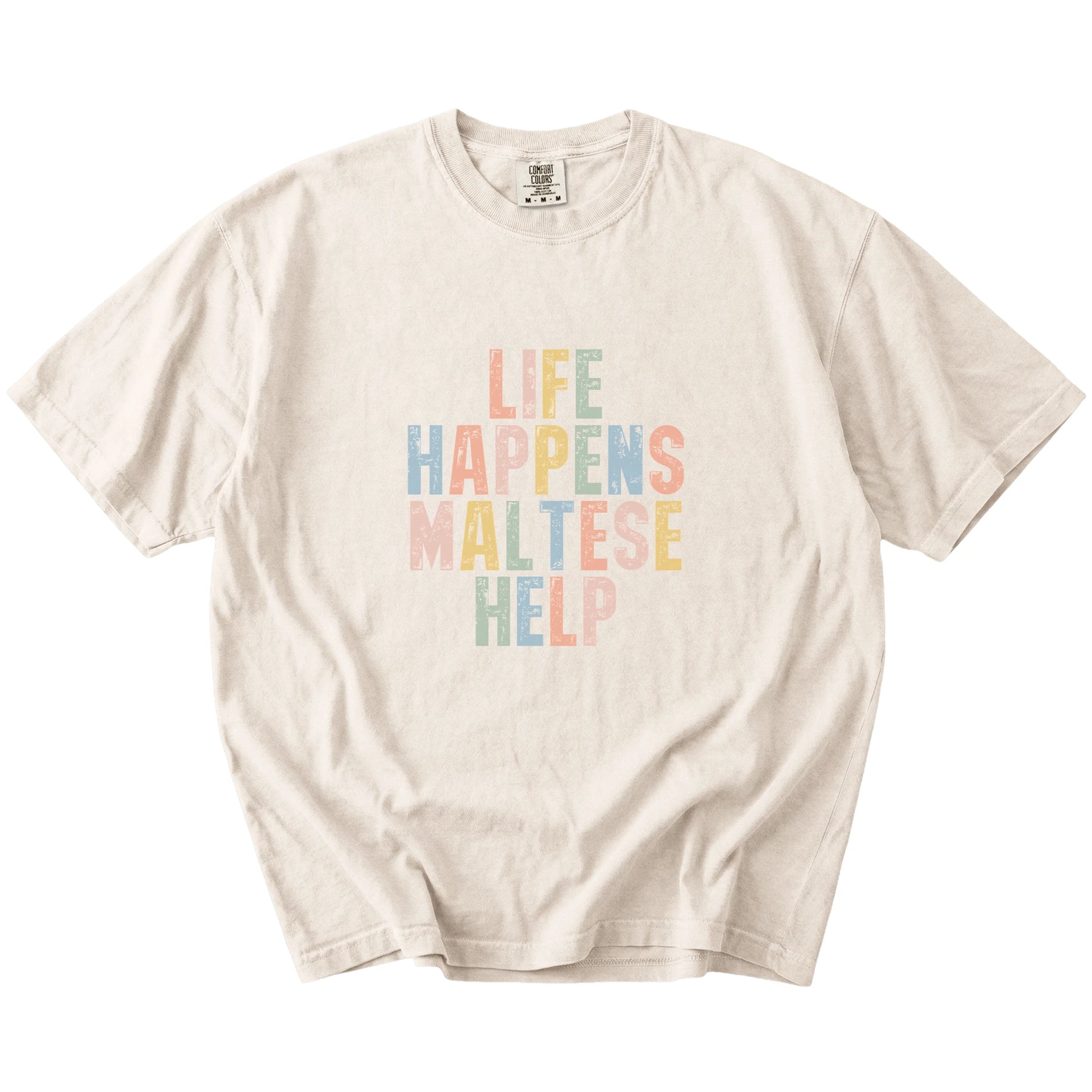 Maltese making hard days better with “Life Happens, Dogs Help” lettering on a Ivory Comfort Colors® T-shirt
