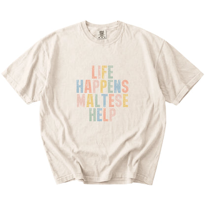 Maltese making hard days better with “Life Happens, Dogs Help” lettering on a Ivory Comfort Colors® T-shirt