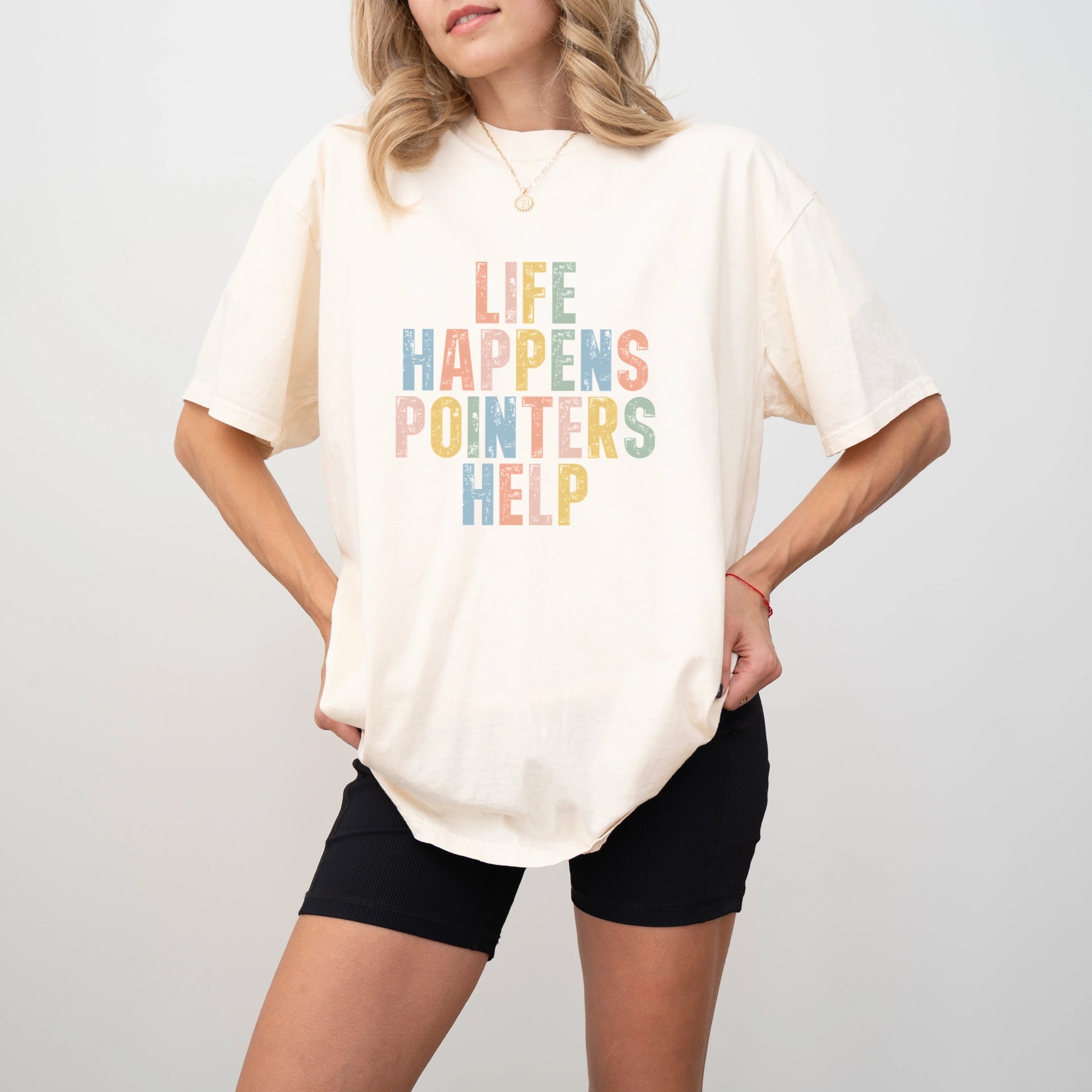 Model wearing a Ivory Comfort Colors® T-shirt featuring Pointer making hard days better with “Life Happens, Dogs Help” letter