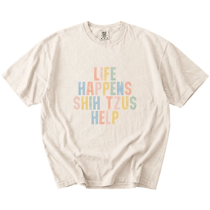 retro “Life Happens, Shih Tzus Help” lettering on a Ivory Comfort Colors® T-shirt