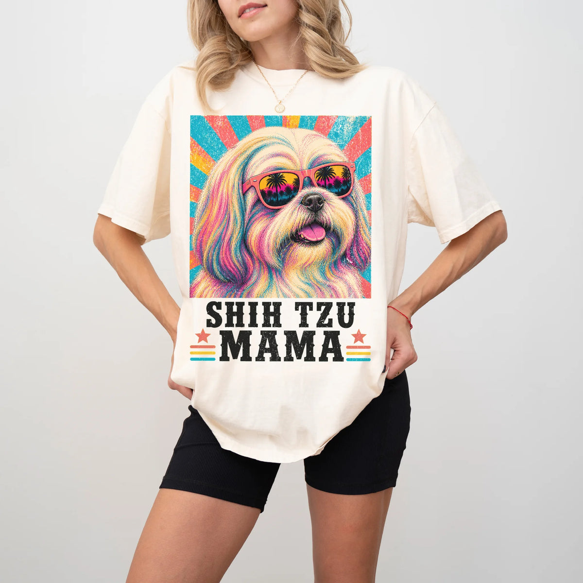 Retro Shih Tzu Mama design on a Ivory Comfort Colors T-shirt worn by a model