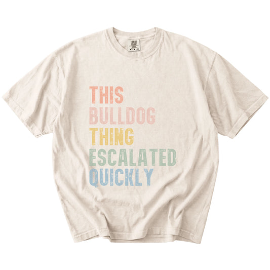 retro “This Bulldog Thing Escalated Quickly” lettering on a Ivory Comfort Colors® T-shirt