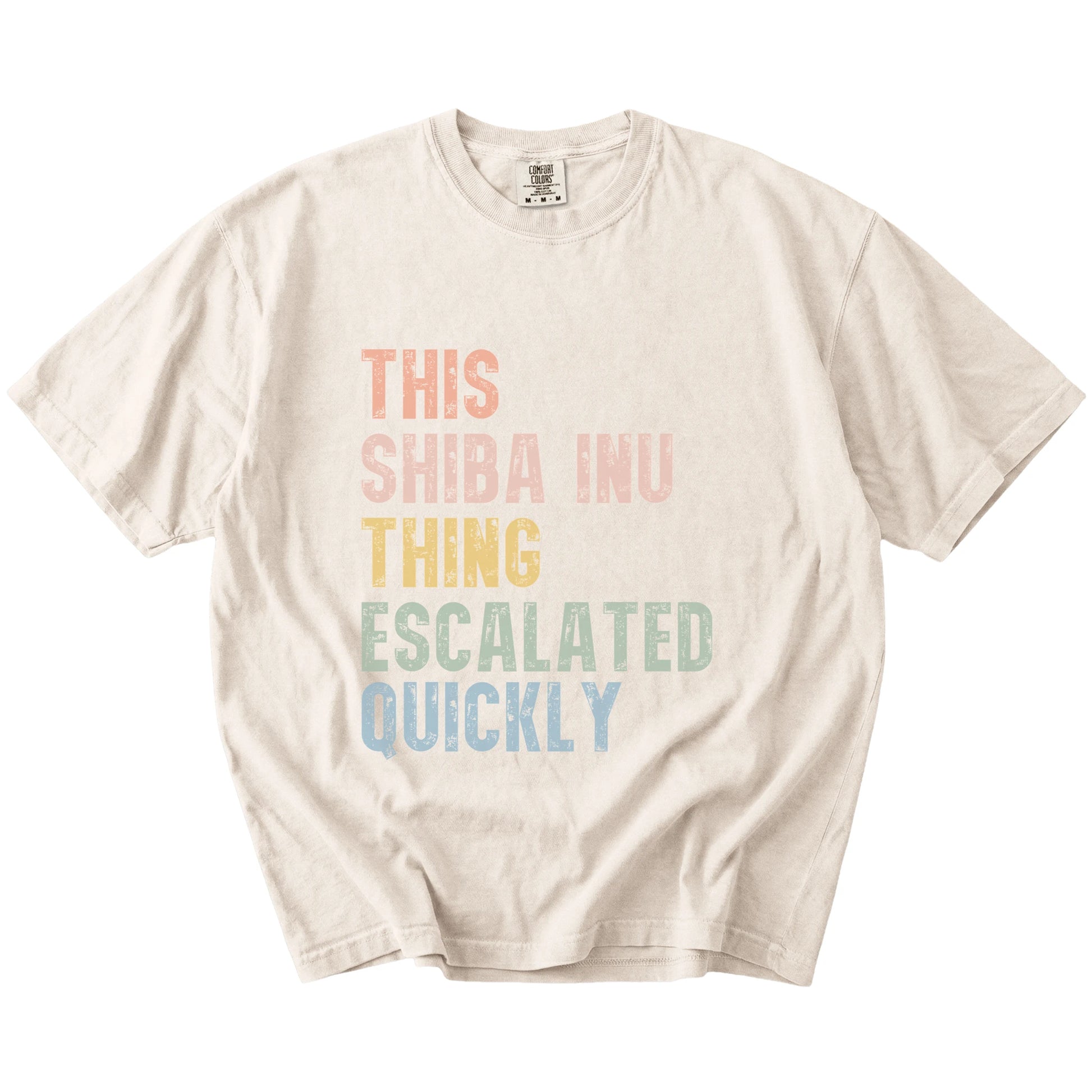 retro “This Shiba Inu Thing Escalated Quickly” lettering on a Ivory Comfort Colors® T-shirt