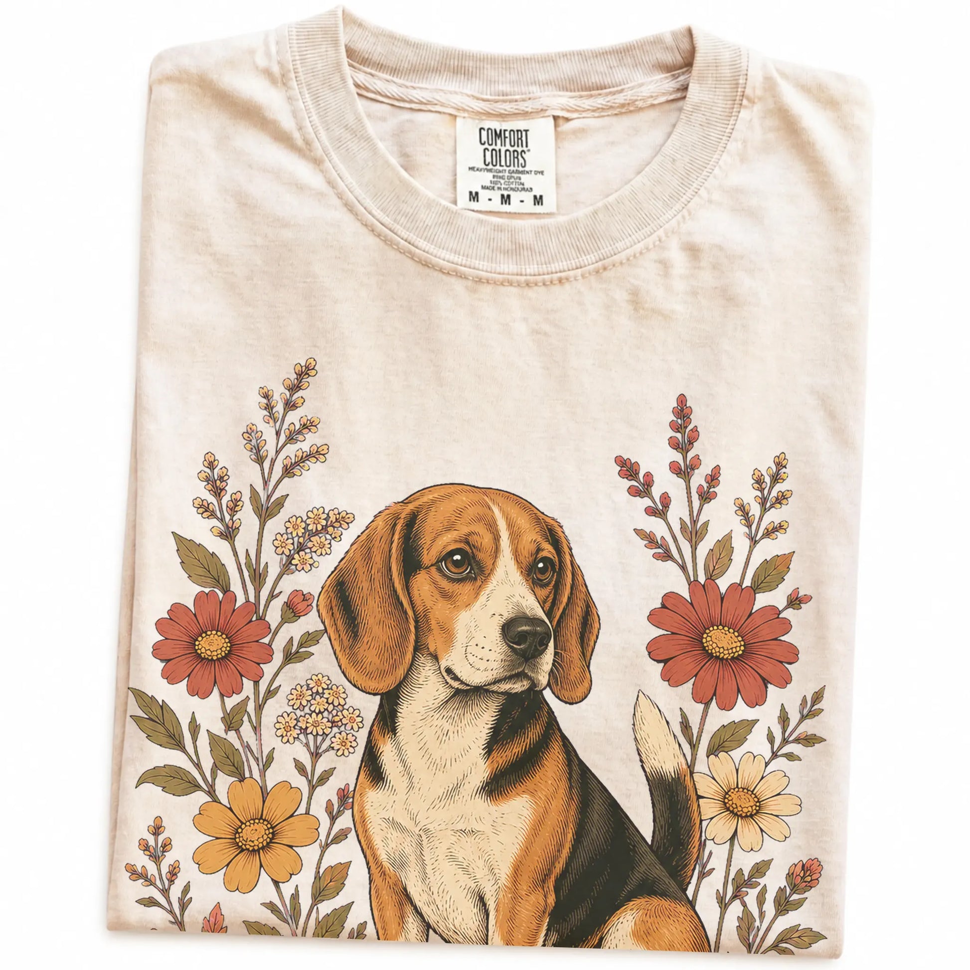 Folded Ivory Comfort Colors® T-shirt showing Beagle portrait surrounded by wildflowers beneath the moon