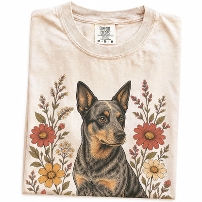 Folded Ivory Comfort Colors® T-shirt showing Blue Heeler portrait surrounded by wildflowers beneath the moon