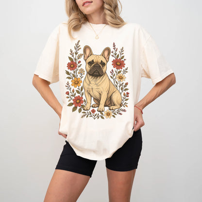 Model wearing an Ivory Comfort Colors® T-shirt showing French Bulldog portrait surrounded by wildflowers beneath the moon