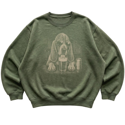 Military Green Basset Hound drinking from a pint at a bar, laid flat