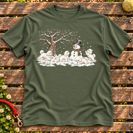 Bichon Frise puppies playing in snow with a snowman on a Military Green T-shirt