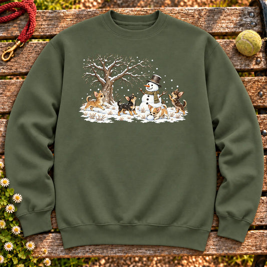 Chihuahua puppies playing in snow with a snowman on a Military Green sweatshirt