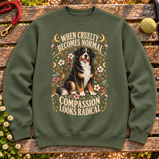 Compassion Looks Radical Bernese Mountain Dog design on a Military Green Gildan sweatshirt