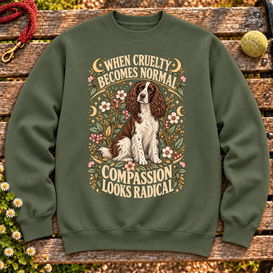 Compassion Looks Radical Springer Spaniel design on a Military Green Gildan sweatshirt