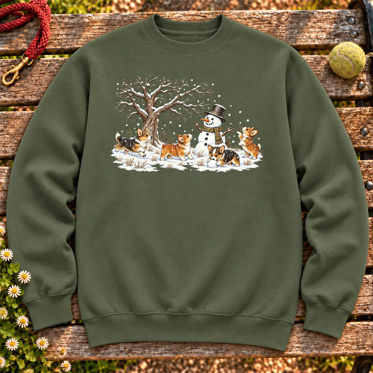 Corgi puppies playing in snow with a snowman on a Military Green sweatshirt