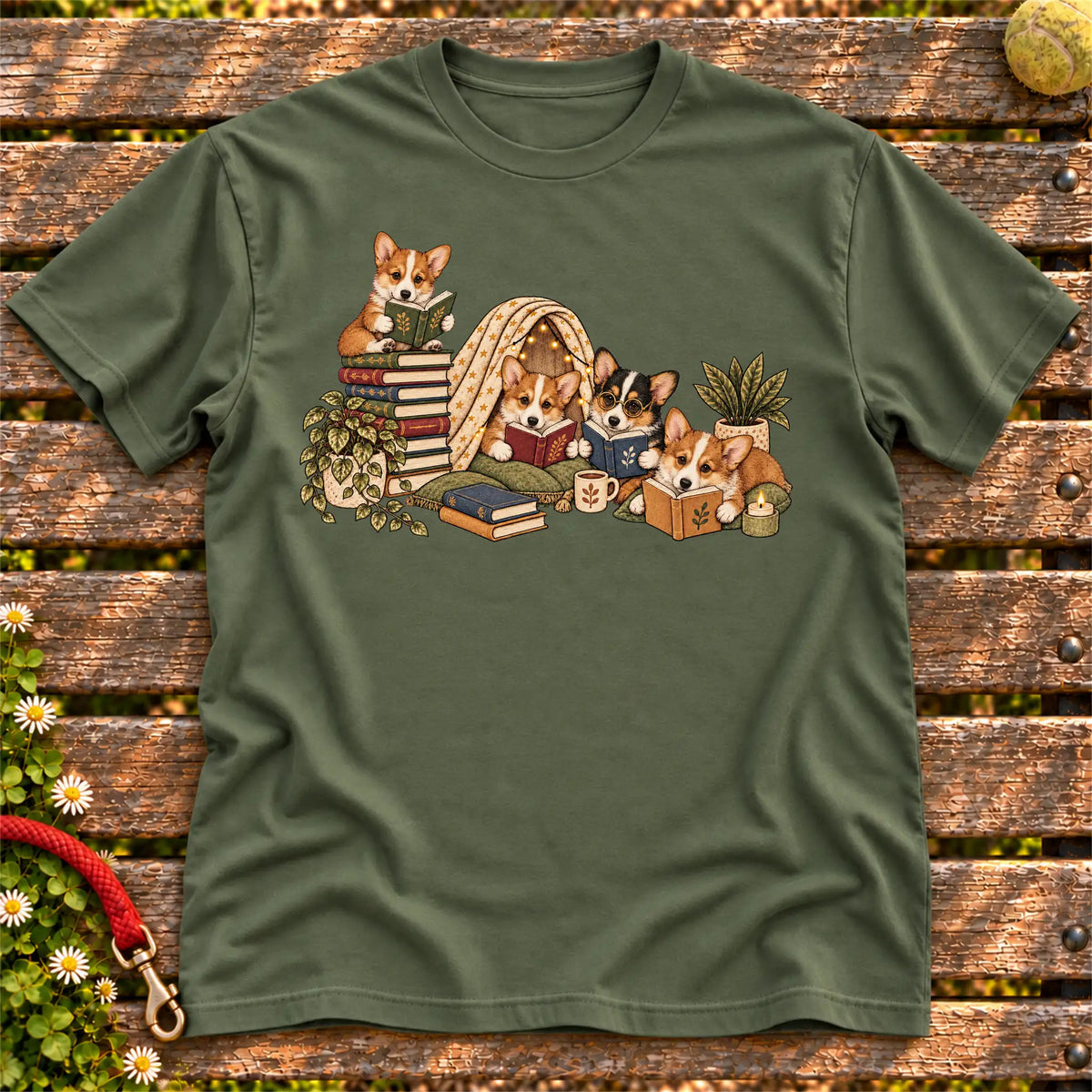 Corgi puppies reading books in a cozy blanket fort on a Military Green T-shirt